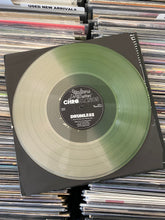 Load image into Gallery viewer, CHROMATICS – DRUMLESS LP (USED, CLEAR/HOURGLASS VINYL)
